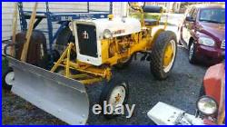 1969 International Cub C-60 Tractor with Plow and Deck Mower attachments