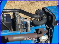 1996 New Holland 1215 Compact Tractor with 60 Mid Mount Mower and 4' box blade