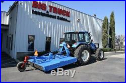 2005 New Holland TL100A 4X4 Tractor With Mower Attachment