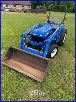 2006 New Holland TC30 4x4 hydrostatic loader tractor and new attachments