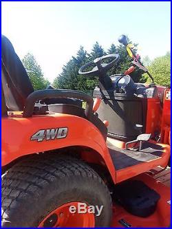 2010 Kubota BX2360 One owner includes trailer, weight box, and yard roller