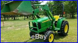 2013 John Deere four-wheel drive 32hp compact loader tractor. FREE DELIVERY