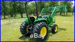 2013 John Deere four-wheel drive 32hp compact loader tractor. FREE DELIVERY