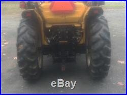 CUB CADET Model 7275 1997 4X4 Compact Tractor withloader, backhoe & mower. Used