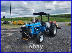 FORD 2910 With Bush Hog SM60 Side Shift Rotary Cutter FORD 2910 With Bush Hog SM60 Side Shift Rotary Cutter