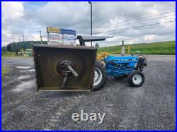 FORD 2910 With Bush Hog SM60 Side Shift Rotary Cutter FORD 2910 With Bush Hog SM60 Side Shift Rotary Cutter