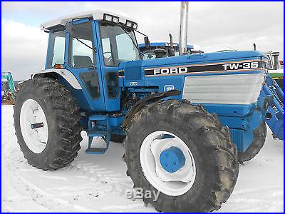 FORD TW-35 4X4 CAB AIR LOW HRS 90% TIRES WORK READY IN PA VERY NICE TRACTOR