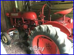 Farmall Cub Tractor 1948 Comes with sickle bar cutter, belly mower & plow