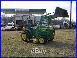 JOHN DEERE 670 4 X 4 LOADER TRACTOR WITH BELLY MOWER