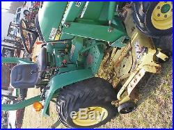 JOHN DEERE 670 4 X 4 LOADER TRACTOR WITH BELLY MOWER