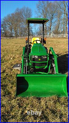 John Deere 1025R Compact Utility Tractor with H-120 Loader, Mower & Ballast Box