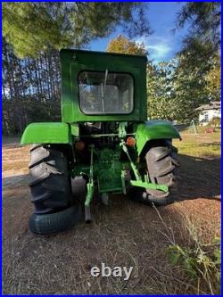 John Deere 2440 Loader Tractor with Front Loader Bucket, Cab, 4-Cyl 60.65 HP John Deere 2440 Loader Tractor with Front Loader Bucket, Cab, 4-Cyl 60.65 HP