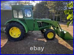 John Deere 2440 Loader Tractor with Front Loader Bucket, Cab, 4-Cyl 60.65 HP John Deere 2440 Loader Tractor with Front Loader Bucket, Cab, 4-Cyl 60.65 HP