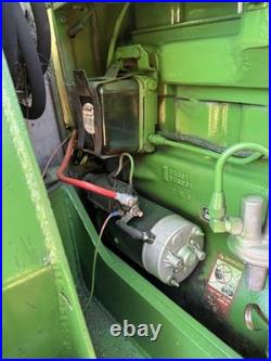 John Deere 2440 Loader Tractor with Front Loader Bucket, Cab, 4-Cyl 60.65 HP John Deere 2440 Loader Tractor with Front Loader Bucket, Cab, 4-Cyl 60.65 HP