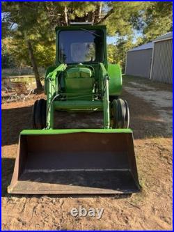 John Deere 2440 Loader Tractor with Front Loader Bucket, Cab, 4-Cyl 60.65 HP John Deere 2440 Loader Tractor with Front Loader Bucket, Cab, 4-Cyl 60.65 HP