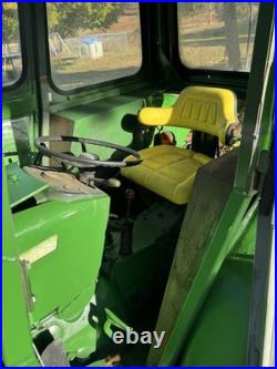 John Deere 2440 Loader Tractor with Front Loader Bucket, Cab, 4-Cyl 60.65 HP John Deere 2440 Loader Tractor with Front Loader Bucket, Cab, 4-Cyl 60.65 HP