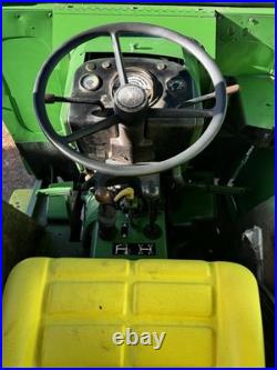 John Deere 2440 Loader Tractor with Front Loader Bucket, Cab, 4-Cyl 60.65 HP John Deere 2440 Loader Tractor with Front Loader Bucket, Cab, 4-Cyl 60.65 HP
