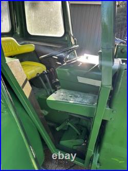 John Deere 2440 Loader Tractor with Front Loader Bucket, Cab, 4-Cyl 60.65 HP John Deere 2440 Loader Tractor with Front Loader Bucket, Cab, 4-Cyl 60.65 HP
