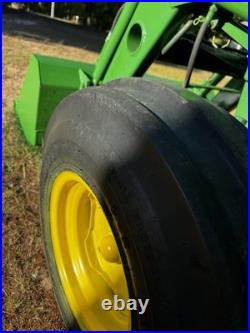 John Deere 2440 Loader Tractor with Front Loader Bucket, Cab, 4-Cyl 60.65 HP John Deere 2440 Loader Tractor with Front Loader Bucket, Cab, 4-Cyl 60.65 HP