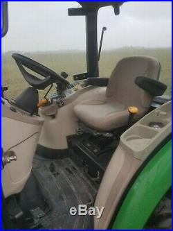 John Deere 3520 compact tractor with deluxe cab and loader with rear hydraulics