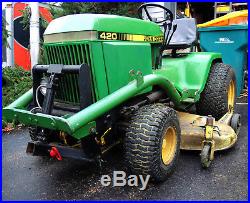 John Deere 420 with model 44 front end loader 60 mower deck, and 48 snow plow