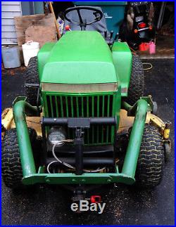 John Deere 420 with model 44 front end loader 60 mower deck, and 48 snow plow