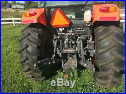 KUBOTA M7060 4WD UTILITY TRACTOR WithCAB HEAT & AC WITH LOADER