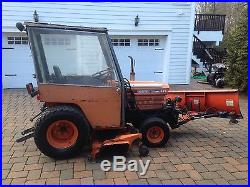Kubota B7200 17 HP 4 Wheel Drive Tractor With 60' Front Snow Blade, Mower, and Cab