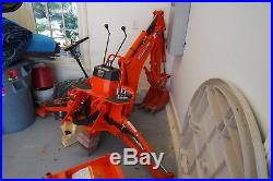 Kubota BX25D Front End Loader and Backhoe with several attachments