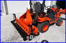Kubota BX25D Front End Loader and Backhoe with several attachments