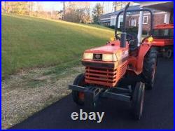 Kubota L-2250 tractor with 4 ft Flail Mower