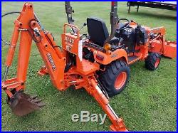 Kubota bx23 tractor with loader backhoe and front mount snowblower