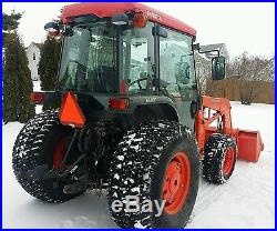 Kubota tractor 4x4 with cab, loader, and low hours