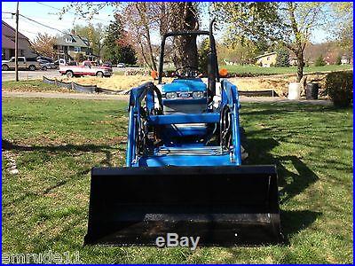 NEW HOLLAND 1720 TRACTOR LOADER RUBBER TIRE LOADER THREE POINT HITCH