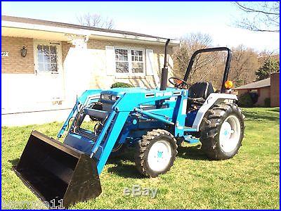 NEW HOLLAND 1720 TRACTOR LOADER RUBBER TIRE LOADER THREE POINT HITCH