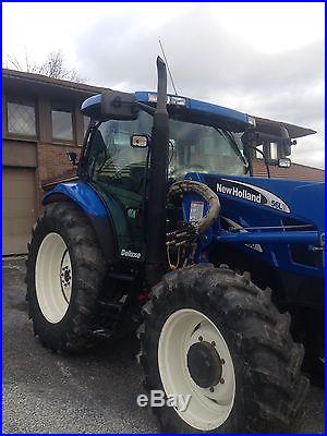 NEW HOLLAND TS100A DELUXE CAB W/LOADER