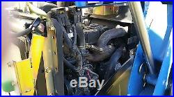 NEW HOLLAND TZ-18DA COMPACT 4X4 TRACTOR WITH 50 HRS with FRONT END LOADER