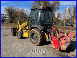 NEW HOLLAND U80C TRACTOR LOADER with Seppi Land Clearing Attachment