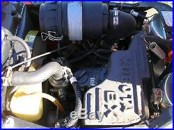 NICE KUBOTA BX1500 4 WHEEL DRIVE TRACTOR WITH MID MOUNT MOWER DECK