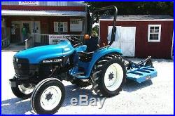 New Holland 1725 Tractor with New TRI 5 ft. Brush Hog -Shipping $1.85 Mile