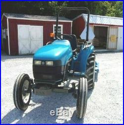 New Holland 1725 Tractor with New TRI 5 ft. Brush Hog -Shipping $1.85 Mile