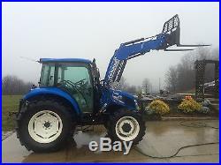New Holland Farm Tractor 4X4 with attachments