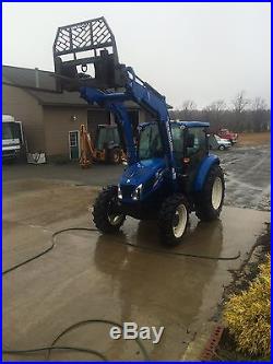 New Holland Farm Tractor 4X4 with attachments