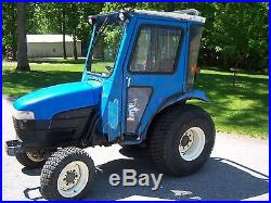 New Holland TC25D 4 wheel drive diesel tractor with cab and heat
