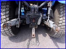 New Holland TC25 withNew Holland 7308 Loader and 72 inch Mower Deck