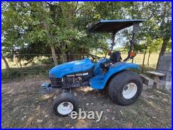 New Holland TC33 Tractor With Woods RD7200 Mower Attachment New Holland TC33 Tractor With Woods RD7200 Mower Attachment
