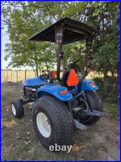 New Holland TC33 Tractor With Woods RD7200 Mower Attachment New Holland TC33 Tractor With Woods RD7200 Mower Attachment