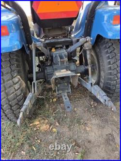 New Holland TC33 Tractor With Woods RD7200 Mower Attachment New Holland TC33 Tractor With Woods RD7200 Mower Attachment
