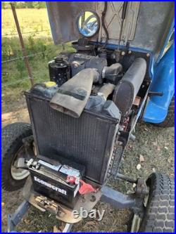 New Holland TC33 Tractor With Woods RD7200 Mower Attachment New Holland TC33 Tractor With Woods RD7200 Mower Attachment
