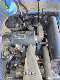 New Holland TC33 Tractor With Woods RD7200 Mower Attachment New Holland TC33 Tractor With Woods RD7200 Mower Attachment